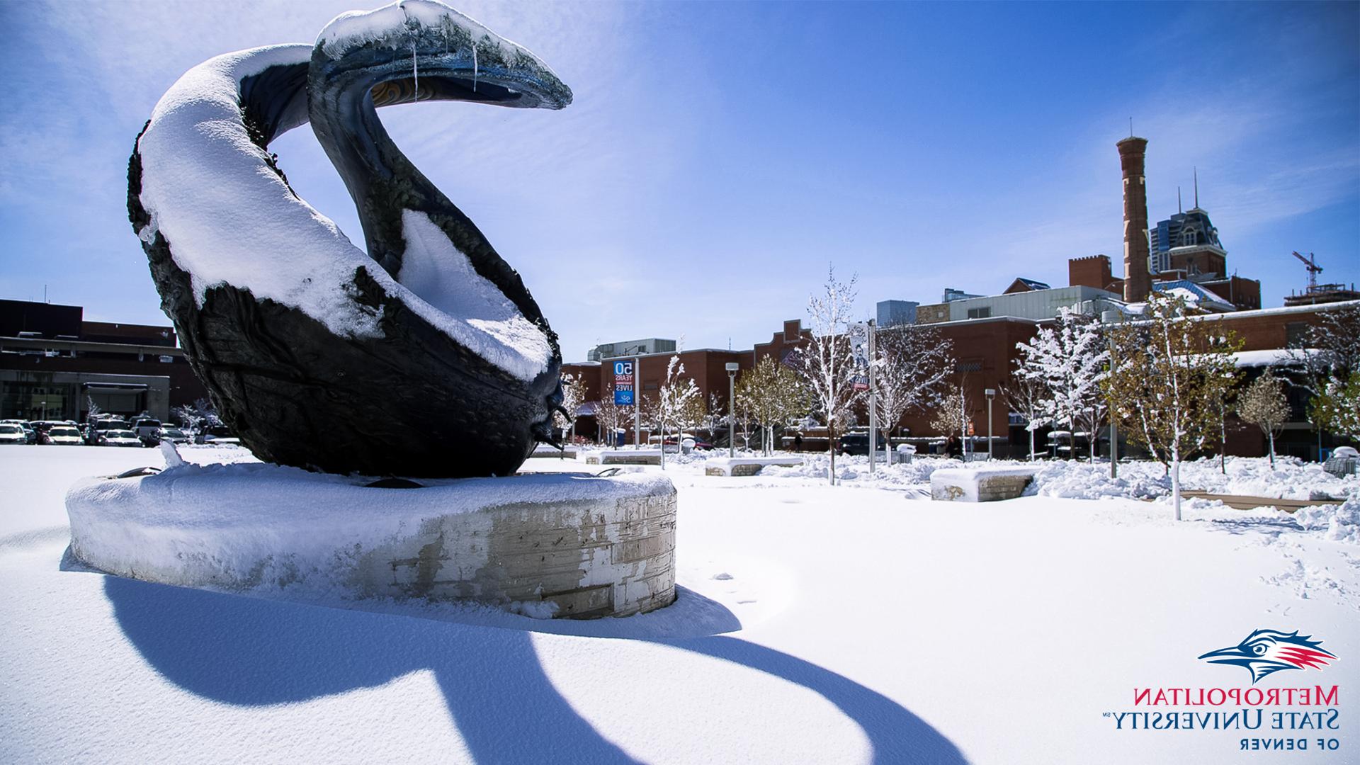 One World One Water sculpture covered in snow